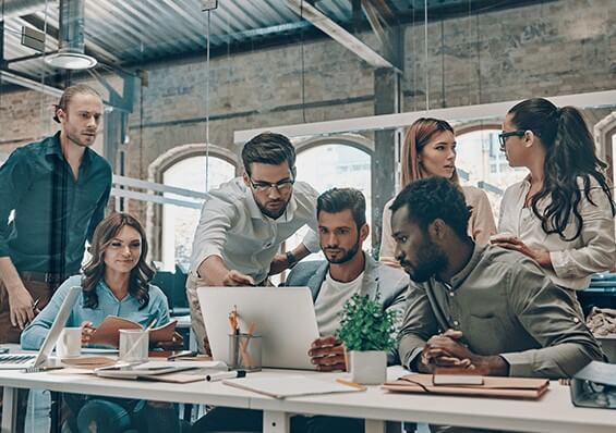 a group of diverse workers in an office setting