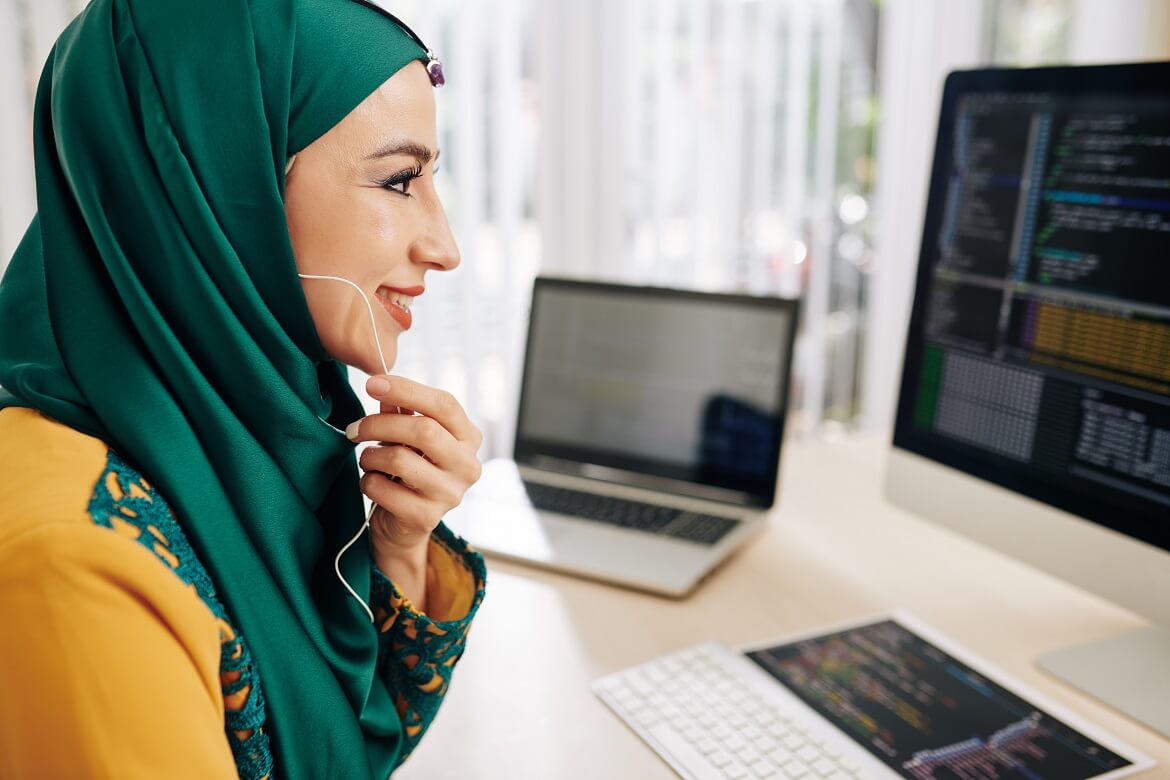 smiling coder calling coworker