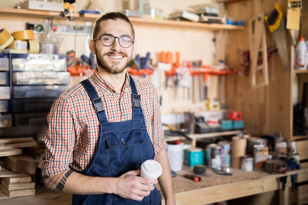 smiling male barista