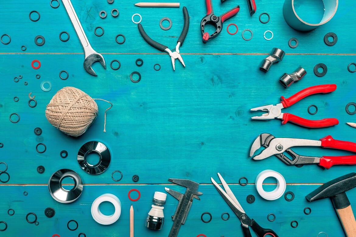 toolkit on work desk top view flat lay